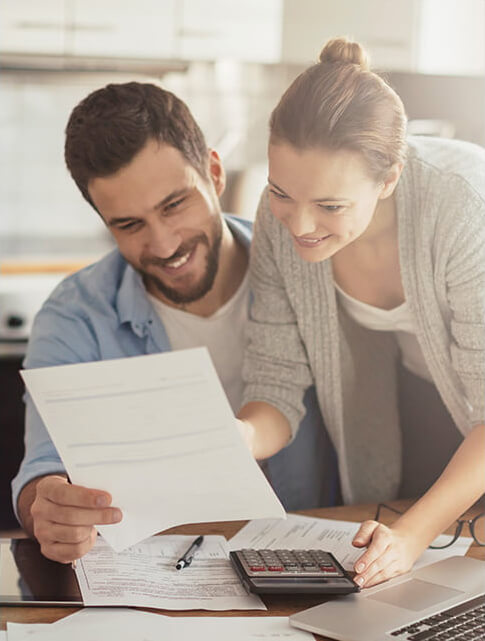 couple looking over paperwork together