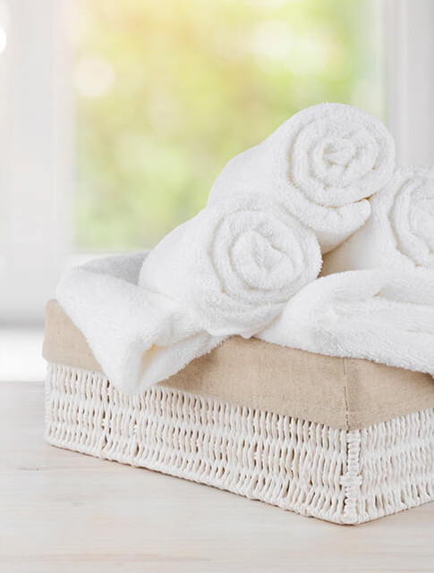 pile of rolled-up towels