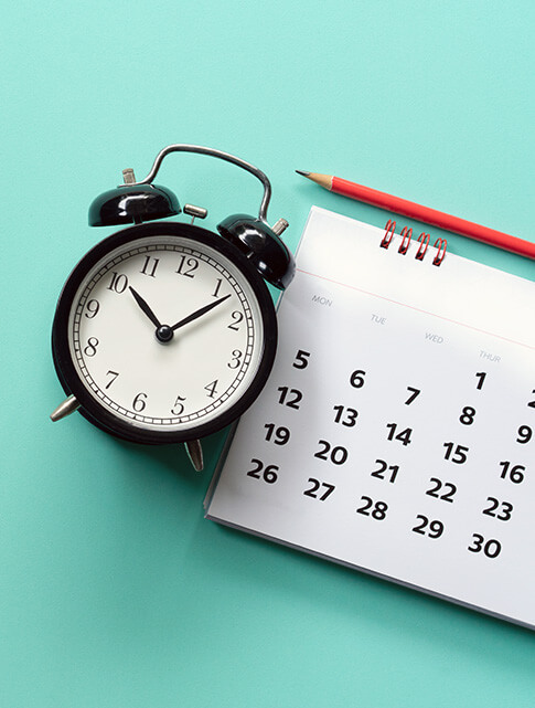 clock and calendar on green background