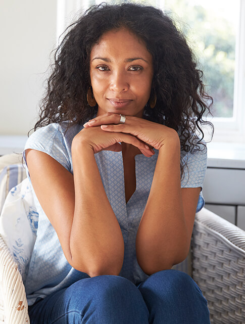 woman slightly smiling