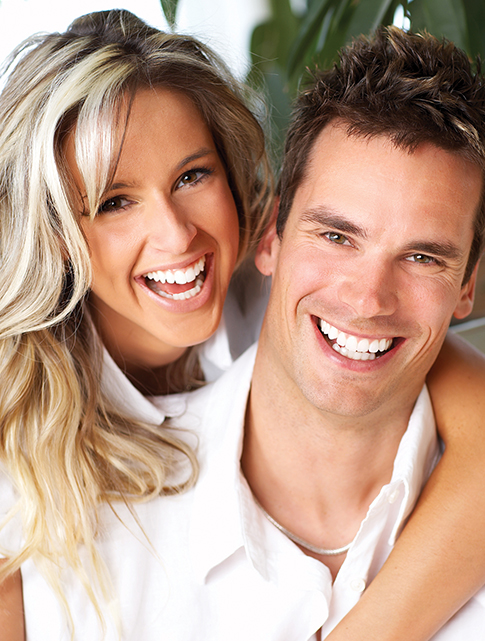 couple with bright white teeth