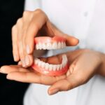 new dentures, adjusting to dentures, denture care, Toland Dental, Wynne AR, Dr. Richard Toland, denture adhesive, denture cleaning