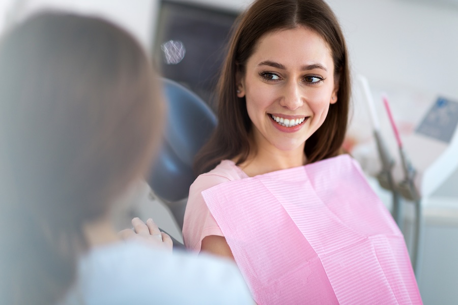 woman in dental chair for consultation for restorative dentistry